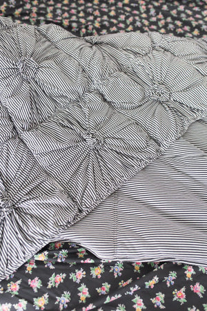 Lazybones Rosette Quilt - Charcoal Stripe